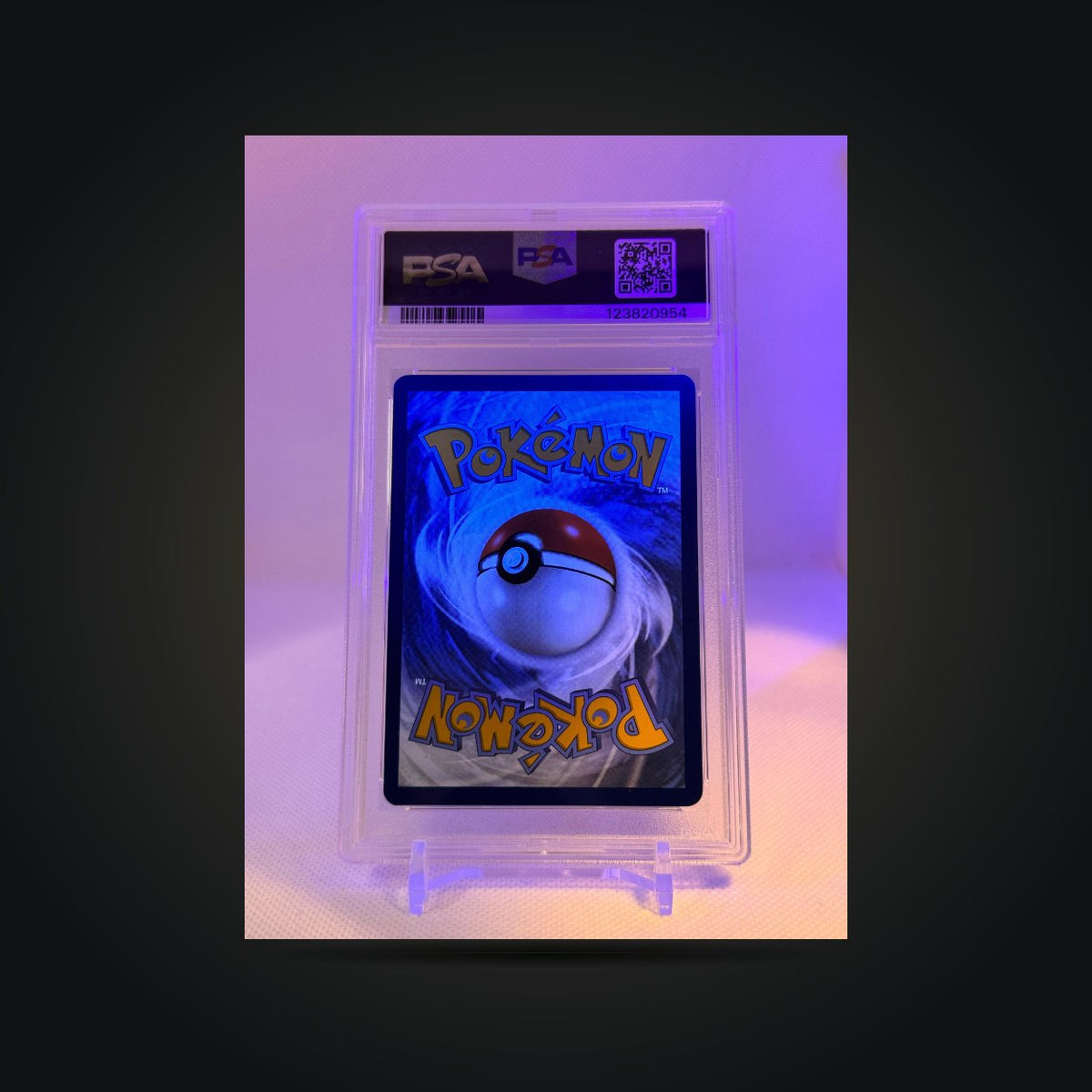 Pokémon Journey Together Salamence ex #187 Special Illustration Rare PSA 9 — back of card in PSA holder under blue-purple lighting