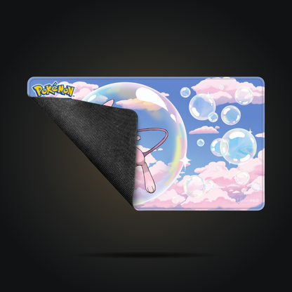 Pokémon Mew playmat with corner folded to show backing